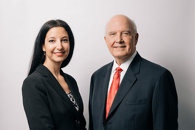 Photo of Isabelle Raquin and Judge Gary E. Bair (Ret.)